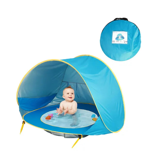 De Baby Beach Bumble Tent biedt een veilige en schaduwrijke plek voor je baby op het strand