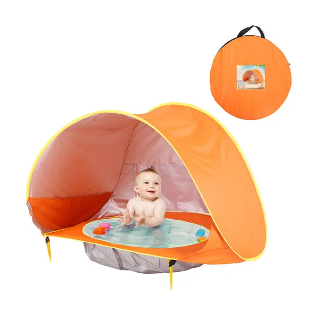 De Baby Beach Bumble Tent biedt een veilige en schaduwrijke plek voor je baby op het strand