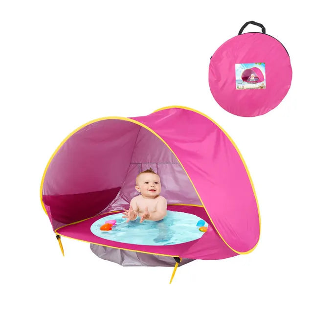 De Baby Beach Bumble Tent biedt een veilige en schaduwrijke plek voor je baby op het strand
