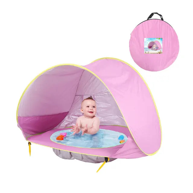 De Baby Beach Bumble Tent biedt een veilige en schaduwrijke plek voor je baby op het strand